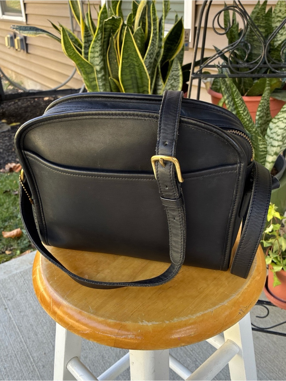 Coach Black Leather Messenger Bag with Gold-Tone Buckle